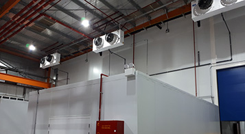 Project name: G2 International LLC, Technopark Dubai<br/>
Refrigeration contractor: Fanar al Khaleej Refrigeration<br/>
Execution: 2017-2018<br/>
Application: Logistic cold store, dry cold store, chiller and freezer cold rooms<br/>
Application with hot gas defrost + electrical in parallel<br/>
Cooling system description:<br/>
- Chilled receiving area: LU-VE Cubic 2# F50HC 1806 E 7 - 40,6kW  (10C_85%_EV-3) R404a<br/>
- 7 cold stores dual application Chiller/Freezer (various sizes): LU-VE Cubic 15# F50HC 1808 E 7 - 21,4kW (-20C_85%_EV-27C) R404a<br/>
- 2 cold stores dual application Chiller/Freezer (various sizes): LU-VE Cubic 4# F50HC 1806 E 7 - 17,4kW (-20C_85%_EV-27C) R404a<br/>
- 1 cold stores dual application Chiller/Freezer (various sizes): LU-VE Cubic 1# F45HC 1320 E 7 - 30,3kW (-20C_85%_EV-27C) R404a<br/>
- Corridor: LU-VE Cubic 2# F50HC 1706 E 6 - 40,6kW  (5_85%_EV-3) R404a<br/>
- Dry storage area (1800sqm): LU-VE Cubic 3# F71HC 4208 N 6 – 65,8kW (22C_65%_EV-27C) R134a<br/>
- Technical Store: LU-VE Cubic 1# F45HC 1112 N 4 – 28,9kW (22C_65%_EV-27C) R134a<br/>
- Plant room: LU-VE Cubic 1# F35HC 261 N 6 – 19,4kW (25C_65%_EV-27C) R134a<br/>
Rack System:<br/>
- 1# Profroid 200HP Rack for LT application R404a<br/>
- 1# Profroid 120HP Rack for MT application R134a
