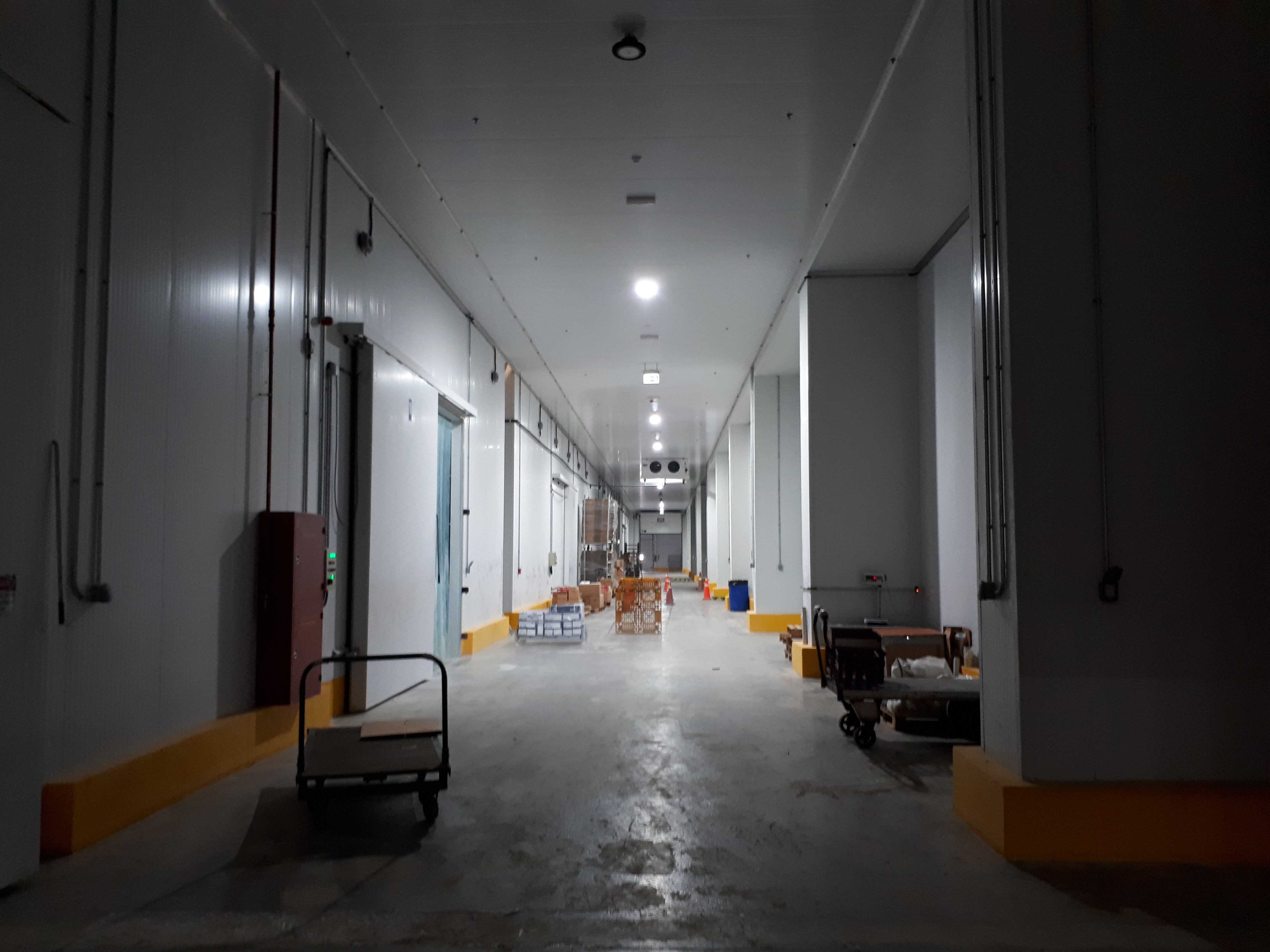 Project name: G2 International LLC, Technopark Dubai<br/>
Refrigeration contractor: Fanar al Khaleej Refrigeration<br/>
Execution: 2017-2018<br/>
Application: Logistic cold store, dry cold store, chiller and freezer cold rooms<br/>
Application with hot gas defrost + electrical in parallel<br/>
Cooling system description:<br/>
- Chilled receiving area: LU-VE Cubic 2# F50HC 1806 E 7 - 40,6kW  (10C_85%_EV-3) R404a<br/>
- 7 cold stores dual application Chiller/Freezer (various sizes): LU-VE Cubic 15# F50HC 1808 E 7 - 21,4kW (-20C_85%_EV-27C) R404a<br/>
- 2 cold stores dual application Chiller/Freezer (various sizes): LU-VE Cubic 4# F50HC 1806 E 7 - 17,4kW (-20C_85%_EV-27C) R404a<br/>
- 1 cold stores dual application Chiller/Freezer (various sizes): LU-VE Cubic 1# F45HC 1320 E 7 - 30,3kW (-20C_85%_EV-27C) R404a<br/>
- Corridor: LU-VE Cubic 2# F50HC 1706 E 6 - 40,6kW  (5_85%_EV-3) R404a<br/>
- Dry storage area (1800sqm): LU-VE Cubic 3# F71HC 4208 N 6 – 65,8kW (22C_65%_EV-27C) R134a<br/>
- Technical Store: LU-VE Cubic 1# F45HC 1112 N 4 – 28,9kW (22C_65%_EV-27C) R134a<br/>
- Plant room: LU-VE Cubic 1# F35HC 261 N 6 – 19,4kW (25C_65%_EV-27C) R134a<br/>
Rack System:<br/>
- 1# Profroid 200HP Rack for LT application R404a<br/>
- 1# Profroid 120HP Rack for MT application R134a
