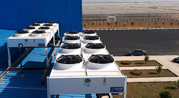 Project name: Cold store and packaging facility for agri product in Cairo<br/>
Refrigeration contractor: MOG for Engineering and Industry, 10th of Ramadan Industrial City, Egypt<br/>
Execution 2018<br/>
Application: facility for collection, precooling, packaging and storage of various fruits and vegetables (lemon, oranges, strawberry, peas, pomegranate etc.). This project is part of a larger plan to develop the agricultural industry of Egypt, by boosting the facilities to serve the export market (Mainly northern Europe and Russia). Currently two additional cold store are under installation and commissioning.<br/>
Cooling system description:<br/>
- Chilled receiving area: LU-VE Dual Discharge 3# CD50H 9452 N 6 - 23,7kW  (16C_85%_EV5) R407c<br/>
- 2 precooling rooms: LU-VE Cubic 4# CS71H 4416 E 10 - 67,3kW (0C_85%_EV-5C) R404a<br/>
- Production and packaging hall: LU-VE Dual Discharge 12# CD50H 9456 N 6 - 69,9kW  (18C_85%_EV5) R407c<br/>
- 6 receiving rooms: LU-VE Cubic 6# CS62H 2218 N 6 - 140,8kW (15C_85%_EV5) R407c<br/>
- 6 cold stores: LU-VE Cubic 12# F50HC 1714 E 6 - 31,2kW (0C_85%_EV-5C) R404a<br/>
- Shipping area: LU-VE Dual Discharge 5# CD50H 9452 N 6 -  23,7kW  (16C_85%_EV5) R404a<br/>
Rack System:<br/>
- 4# Emerson 200HP Rack for MT application R407c – 4# LU-VE Condensers EHV90F 374 H 8VENT (2X4)<br/>
- 2# Emerson 180HP Rack for LT application R404a – 2# LU-VE Condensers EAV8S 7231 H 6VENT (2X3)<br/>
- 1# Emerson 200HP Rack for LT application R404a – 1# LU-VE Condensers EHV90F 368 H 6VENT (2X3)